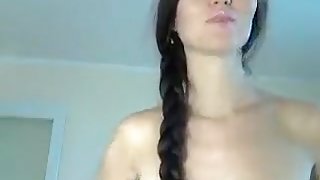 Long-haired brunette Ukrainka hammer her pussy silicone dildo