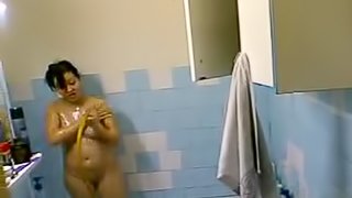 Fat girl showers and dildo fucks