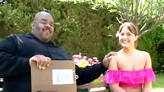 Brunette girl Nicole Parks gets fucked by a black stud in the garden